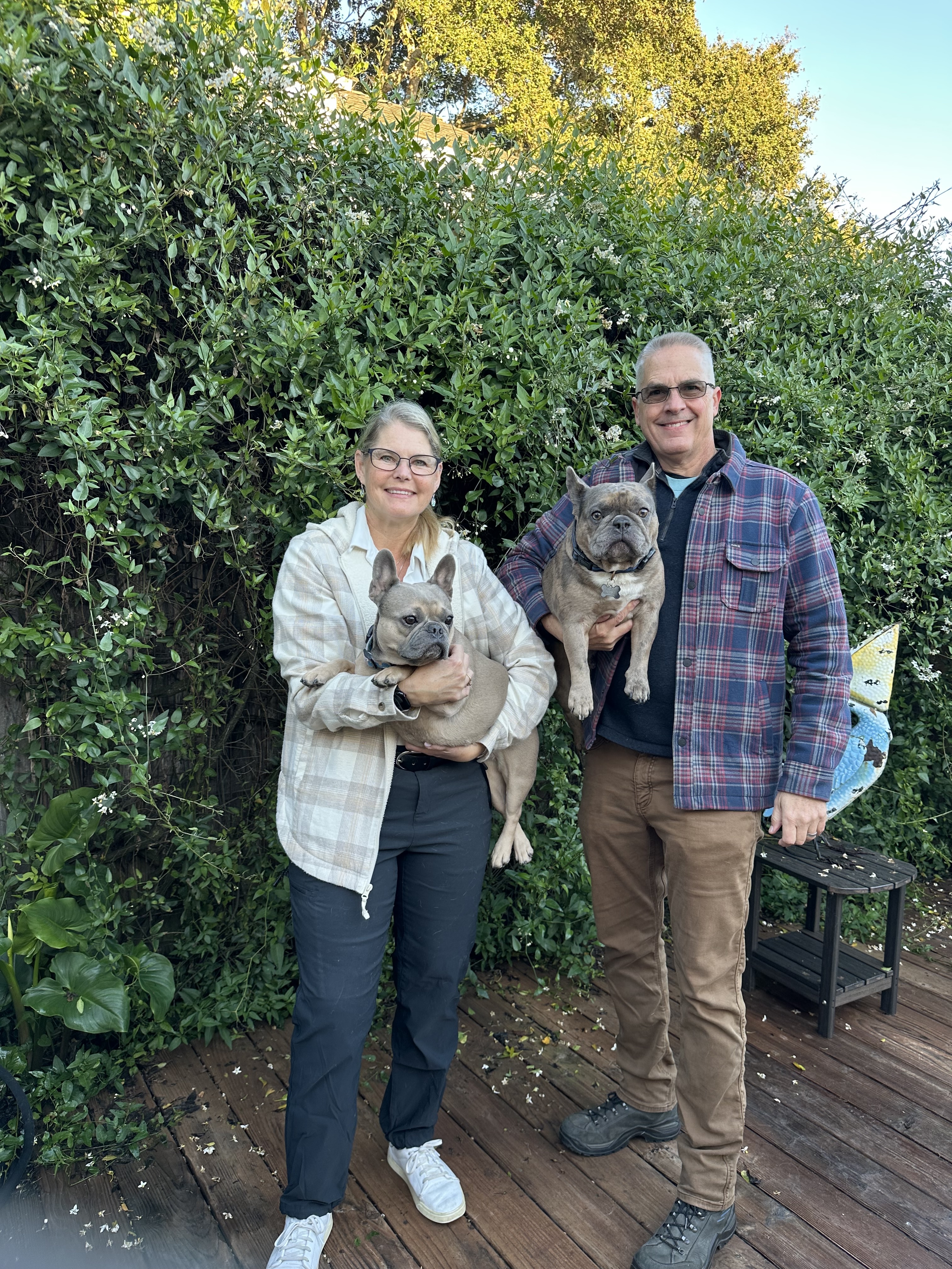 Chief Hober and his wife Anne with their dogs McKenna and Callahan.